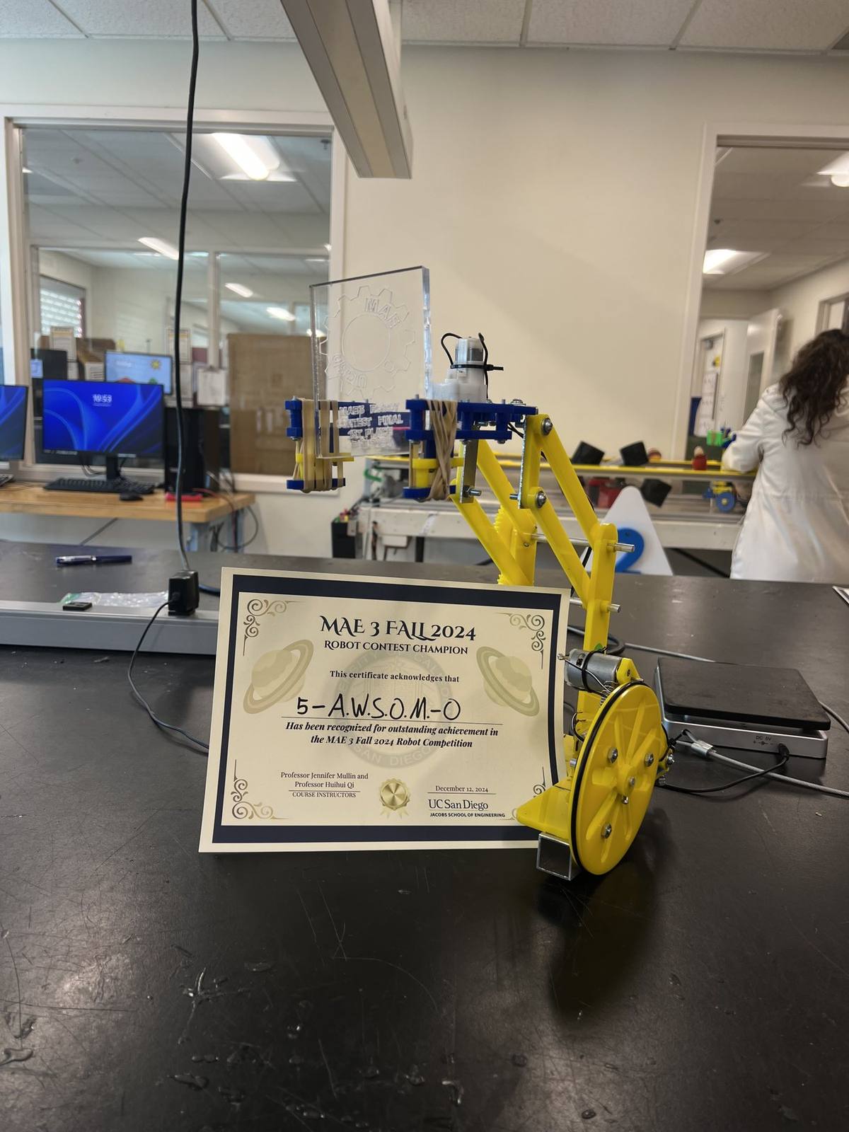 The robot with its first-place certificate